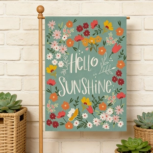 Detailed close-up of blue linen garden flag with Hello Sunshine text and floral decor