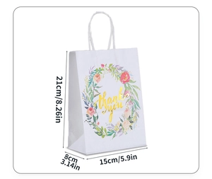 Detailed view of floral gift bag dimensions 21x15x8cm with gold Thank You text