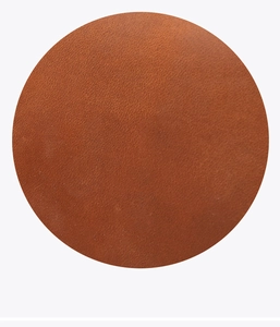 Close-up of brown crazy horse cowhide leather with a natural lychee texture on white background