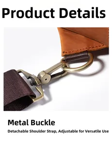 Detail of vintage crazy horse leather bag with bronze hardware and removable strap