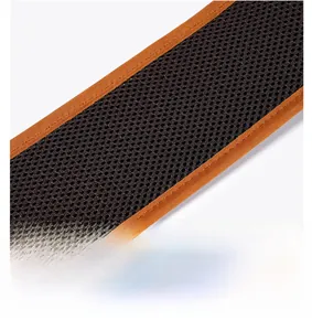 Macro detail of breathable honeycomb mesh shoulder strap with brown leather piping