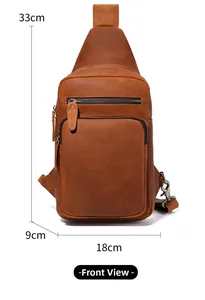 Front view of brown vintage leather sling bag with 33cm x 18cm x 9cm size markings
