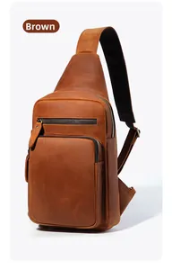 Detailed close-up of brown genuine leather chest bag with premium textured finish