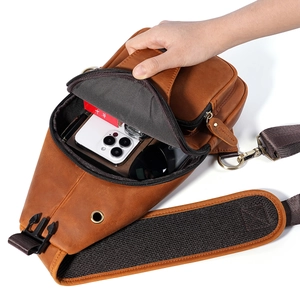 Vintage brown crazy horse leather chest bag with spacious zipper compartments for travel