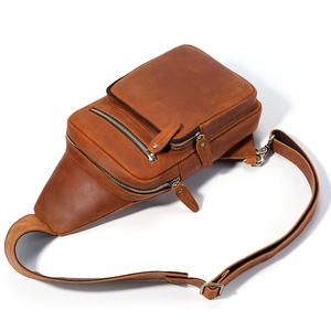 Men's brown genuine leather sling bag in vintage style with multiple zipper pockets
