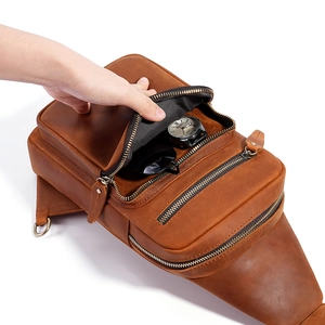 Men's brown genuine leather sling bag with multiple zip compartments for gadgets