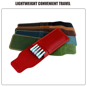 Detail of vintage leather pen pouches in five colors showing stitching and capacity