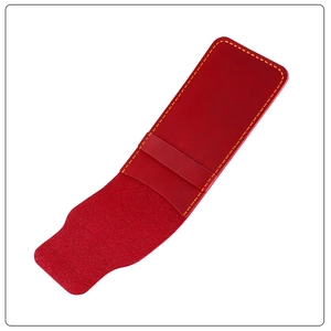 Detailed close-up of red crazy horse leather pen case with contrast yellow stitching
