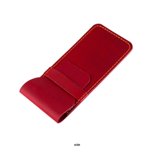 Side view of red vintage crazy horse leather pen holder with yellow stitching detail