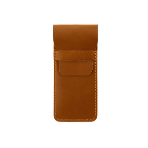 Detail of vintage brown crazy horse leather fountain pen case with fine hand-stitched edges
