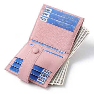 Pink genuine leather bifold wallet with 9 card slots and coin pocket in 45-degree view