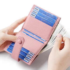 Pink lychee grain leather wallet with 8 card slots and secure snap closure