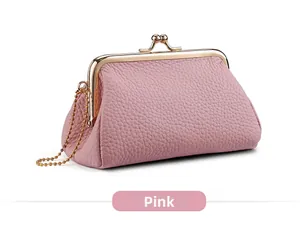 Detailed side view of pink pebbled leather coin purse with gold clasp and bead chain