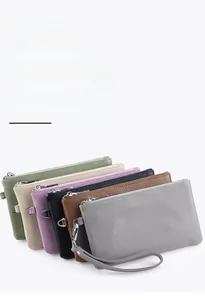 Litchi pattern leather wristlet pouches in six colors with top zipper and D-ring detail