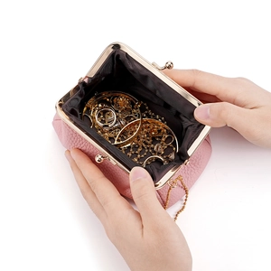 Pink lychee grain leather kiss-lock coin purse with golden chain and jewelry storage space