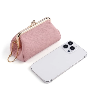 Pink genuine leather coin purse with lychee texture and gold clasp, size scale with phone