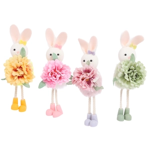 Set of four colorful Easter bunny fairy dolls with pastel flowers and ribbon details