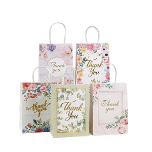 Set of floral gift bags with handles and Thank You text for wedding favors and parties