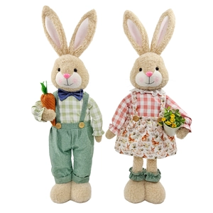 Easter bunny figurines set featuring green plaid male and pink floral female rabbit decor