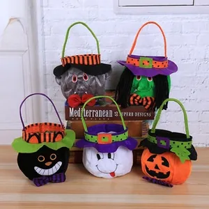 Detail of five Halloween candy bags featuring pumpkin, ghost, witch and bat designs