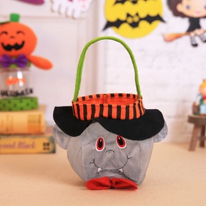 Ghost themed Halloween candy bag with cute vampire face, black hat and green handle