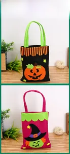 Detail of Halloween felt candy bags featuring pumpkin and witch designs with stars