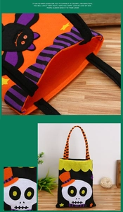 Detailed views of Halloween felt gift bags featuring bat and skull motifs on a wood surface