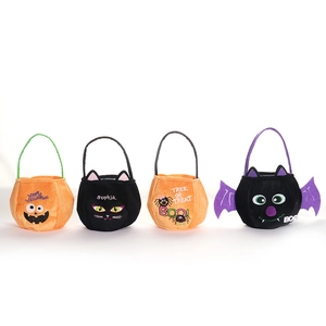 Set of four plush Halloween candy bags with pumpkin, cat, spider and bat designs