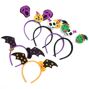 Detail showing various Halloween headbands with pumpkin, ghost and witch hat designs