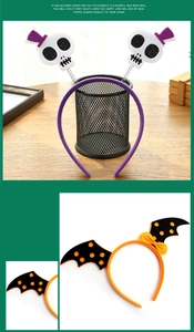 Close-up of Halloween headbands with purple skull hat and orange bat wing designs