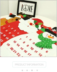 Detail of Christmas felt advent calendar with Santa pockets and reindeer hanging ornaments