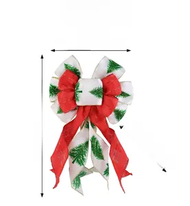 Detail view of 14x7 inch red velvet Christmas bow with green tree print and dimensions