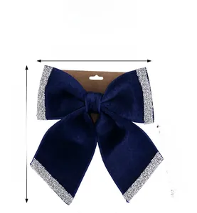 Detail of dark blue velvet Christmas bow with silver sequins and size measurements