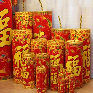 Detail of red festive firecracker decorations with golden Fu characters and patterns