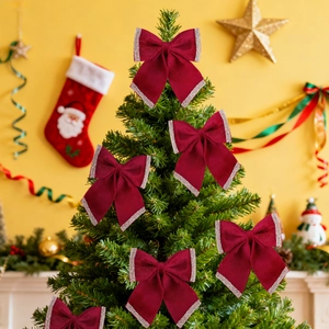 Festive burgundy velvet Christmas bows with silver glitter edges for holiday tree decoration