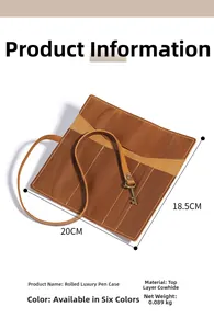 Macro detail of genuine cowhide leather roll pencil case with vintage metal key charm