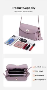 Detail view of purple pebbled leather crossbody bag with organized interior compartments