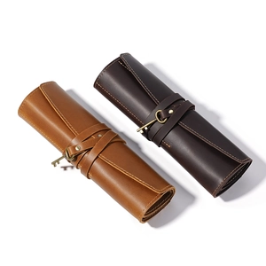 Vintage crazy horse leather roll-up pencil case with retro key charm closure in brown