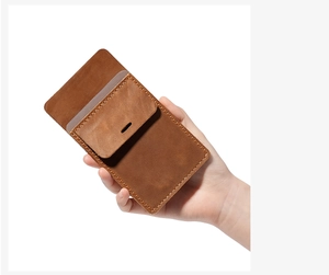 Detailed view of handcrafted brown leather pen holder for doctors with vintage stitching