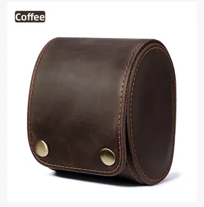 Detail of coffee brown crazy horse leather watch box with orange contrast hand stitching