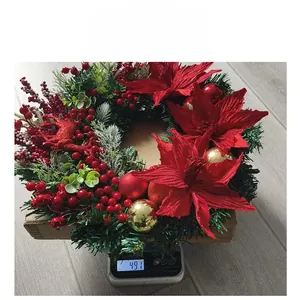 Detailed weight measurement showing Christmas wreath at 491g on a digital scale