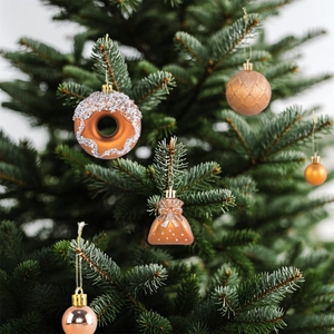 Rose gold and champagne Christmas tree ornaments set with donut and sphere baubles
