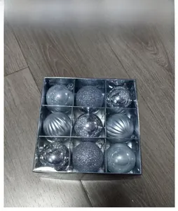 Detailed packaging showing 9 silver Christmas balls with matte and glitter finishes