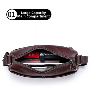 Internal view of dark brown leather crossbody bag showing large storage capacity