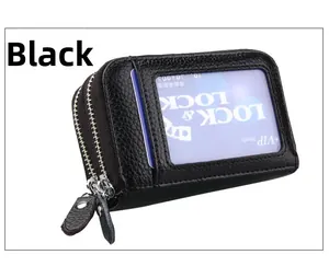 Détail du porte-cartes RFID en cuir noir avec double fermeture éclair et fenêtre d'identité