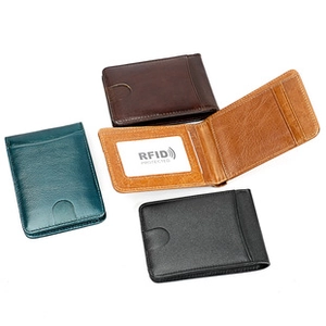 Detailed pile of multi-color leather RFID wallets showing black, brown and blue options