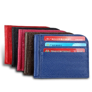 Detail of five RFID leather card holders in various colors with multi-slot design