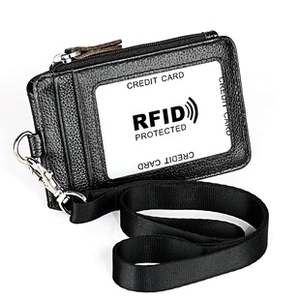 Close-up of black litchi grain leather RFID wallet with card slot and metal zipper hook