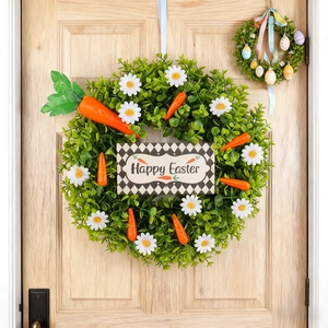 Osterkranz mit Gänseblümchen, Karotten und Eukalyptusblättern mit einem Happy Easter Schild