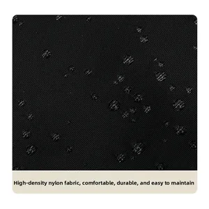 Close-up of high-density waterproof nylon fabric with water droplets on backpack